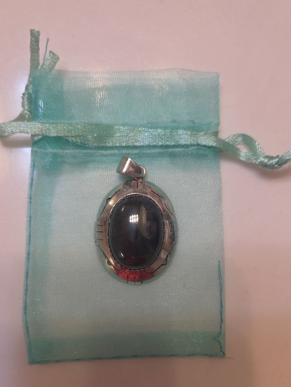 Sterling Silver Hemadite Oval Pendant - Elegant Women's Jewelry